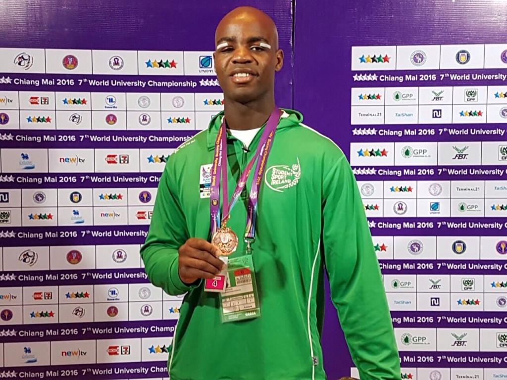 Kenneth Okungbowa (Athlone IT)  shows his bronze medal and his scars after World University Boxing Championships in Chaing Mai. 