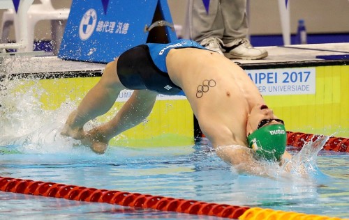 Shane Ryan in action in the heats of the 100m Backstroke in Taipei.