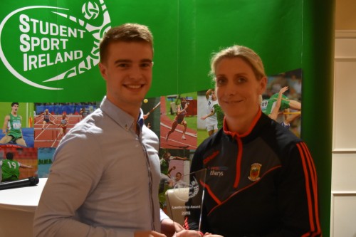 UCC Rowing Captain and winner of the 2018 Student Sport Ireland Leadership Award, David Synnott, receiving his award from Ladies Football legend Cora Staunton. 